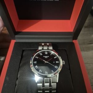 Tissot Black and Silver Watch
